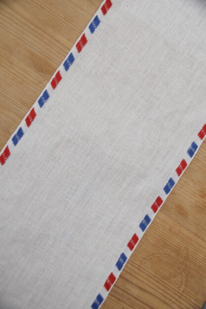 Leinenband creme - rot, blau gestreifter Rand